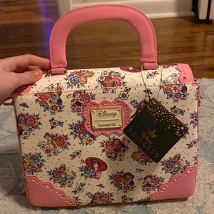 This is a cute Disney princess Loungefly bag!! I received it as a gift.